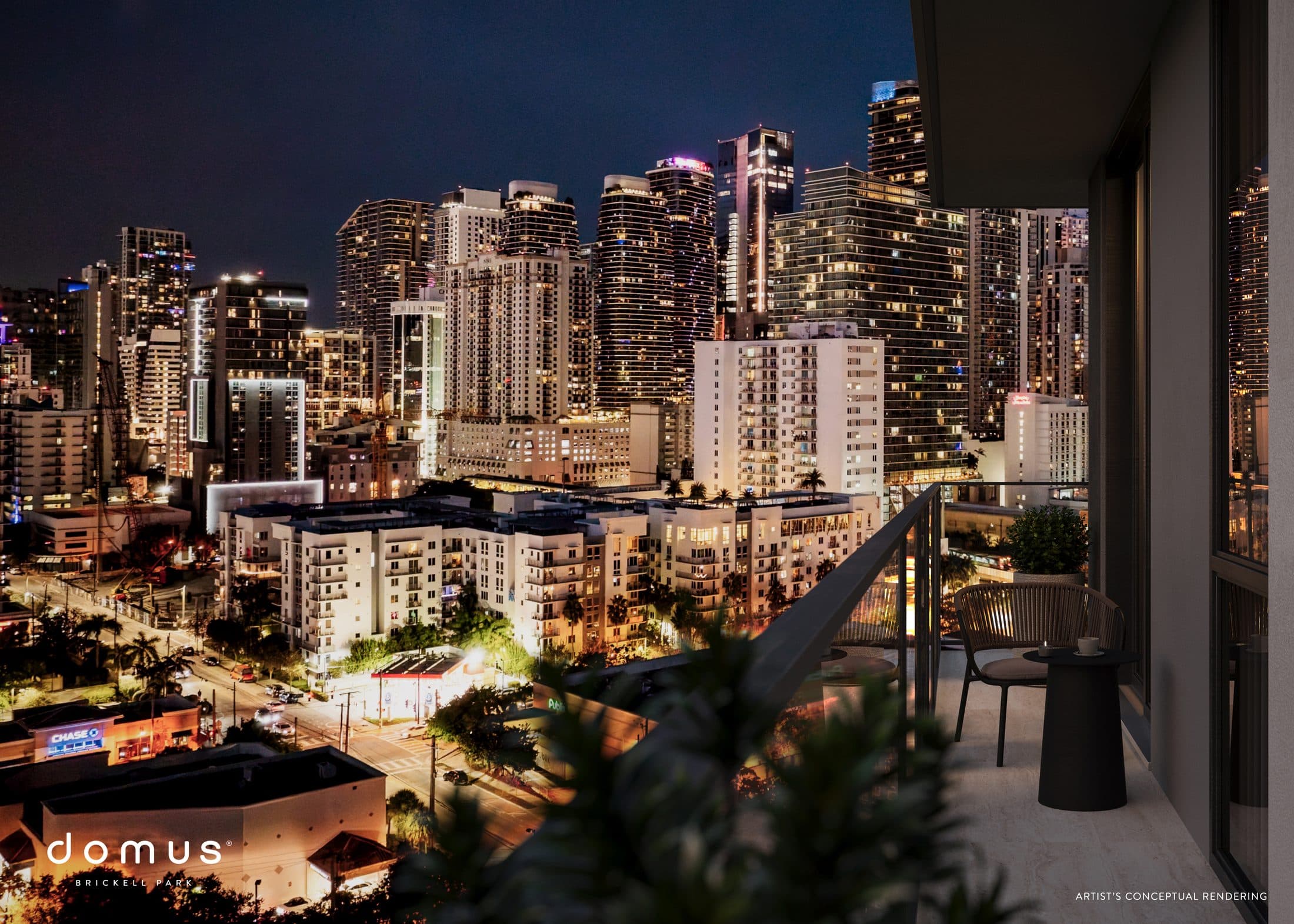 Vista nocturna de Brickell desde un balcón hacia el este